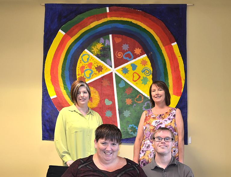 Leanne and Dale Froese, seated, are self-advocates for the developmentally disabled with the Centre for Inclusion and Citizenship. Sara Lige, standing left, is special projects officer and Rachelle Hole, standing right, is co-director of the centre.